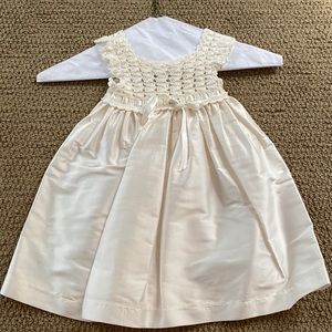 Baby Beau & Belle elegant infant wear. Cream colored dress. Size 3-6 months.